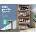 All 4 doors of oak flip shoe cabinet open and loaded with shoes, shoe paradise up to 60 pairs text