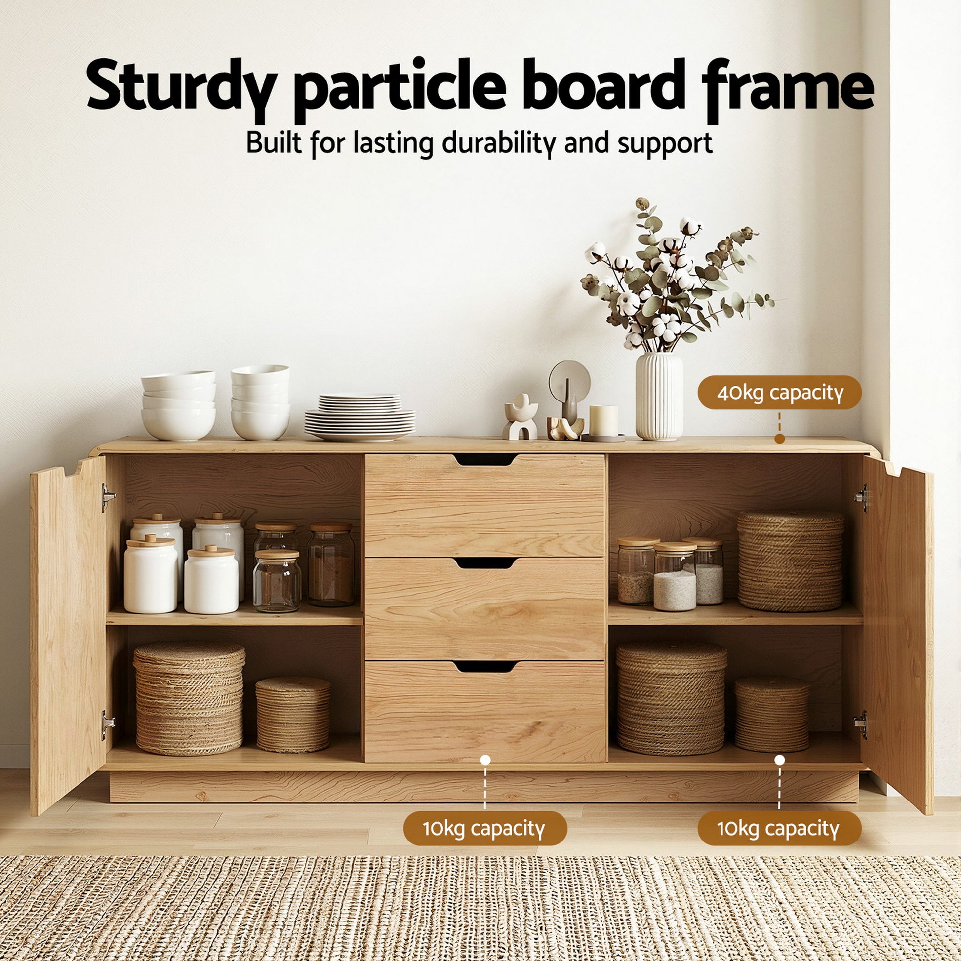 Open oak grain sideboard in room with capacity labels: 40kg top shelf, 10kg each lower shelf, jars and baskets inside