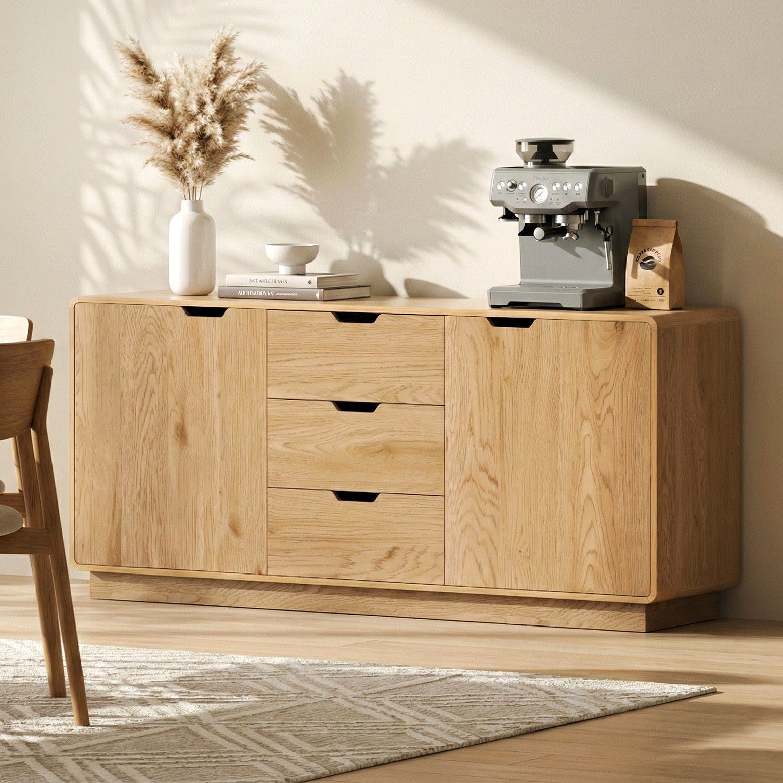 Oak grain sideboard in dining room with coffee machine and vase on top, three central drawers and two side doors