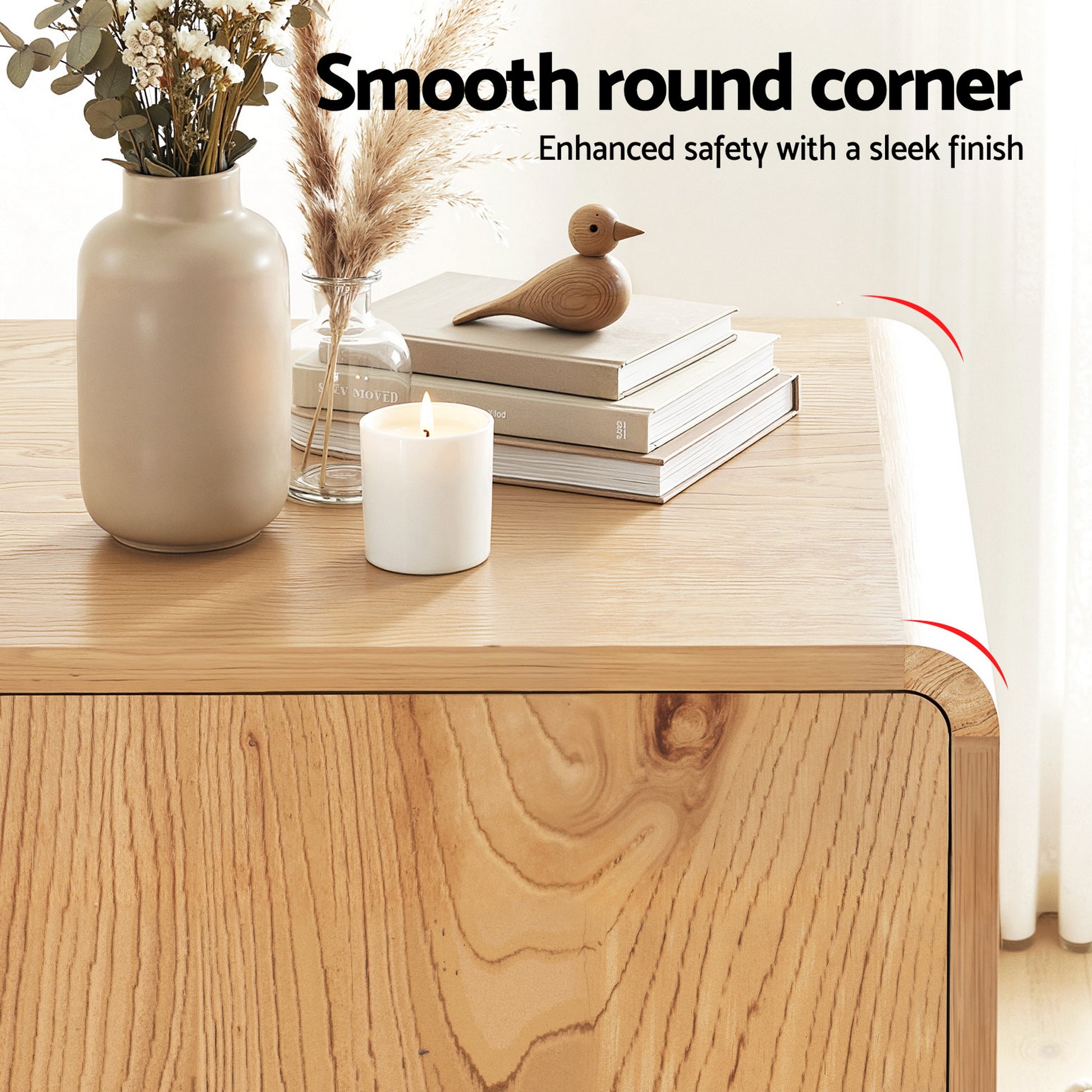 Close-up of oak sideboard rounded corner with vase, candle and books on top, text reads Smooth round corner