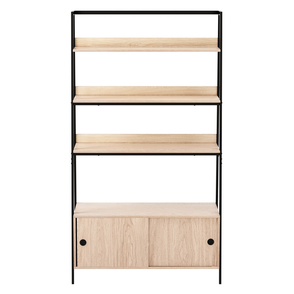 Oak ladder shelf with black metal frame, three open shelves above sliding door cabinet, front view on white background