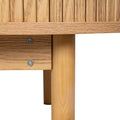 Close-up of oak reeded sideboard tapered leg attached to base rail with two visible screws