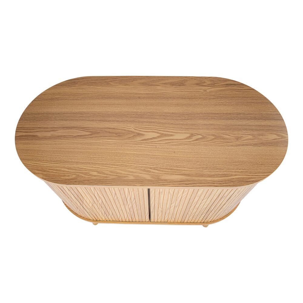 Top-down view of oak reeded sideboard showing oval top with wood grain and reeded door panels below
