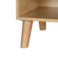 Close-up of oak tapered leg and bottom sliding door track base on oak shoe cabinet