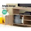 Oak TV stand 140cm ample storage with magnetic door catches and grey white storage boxes inside