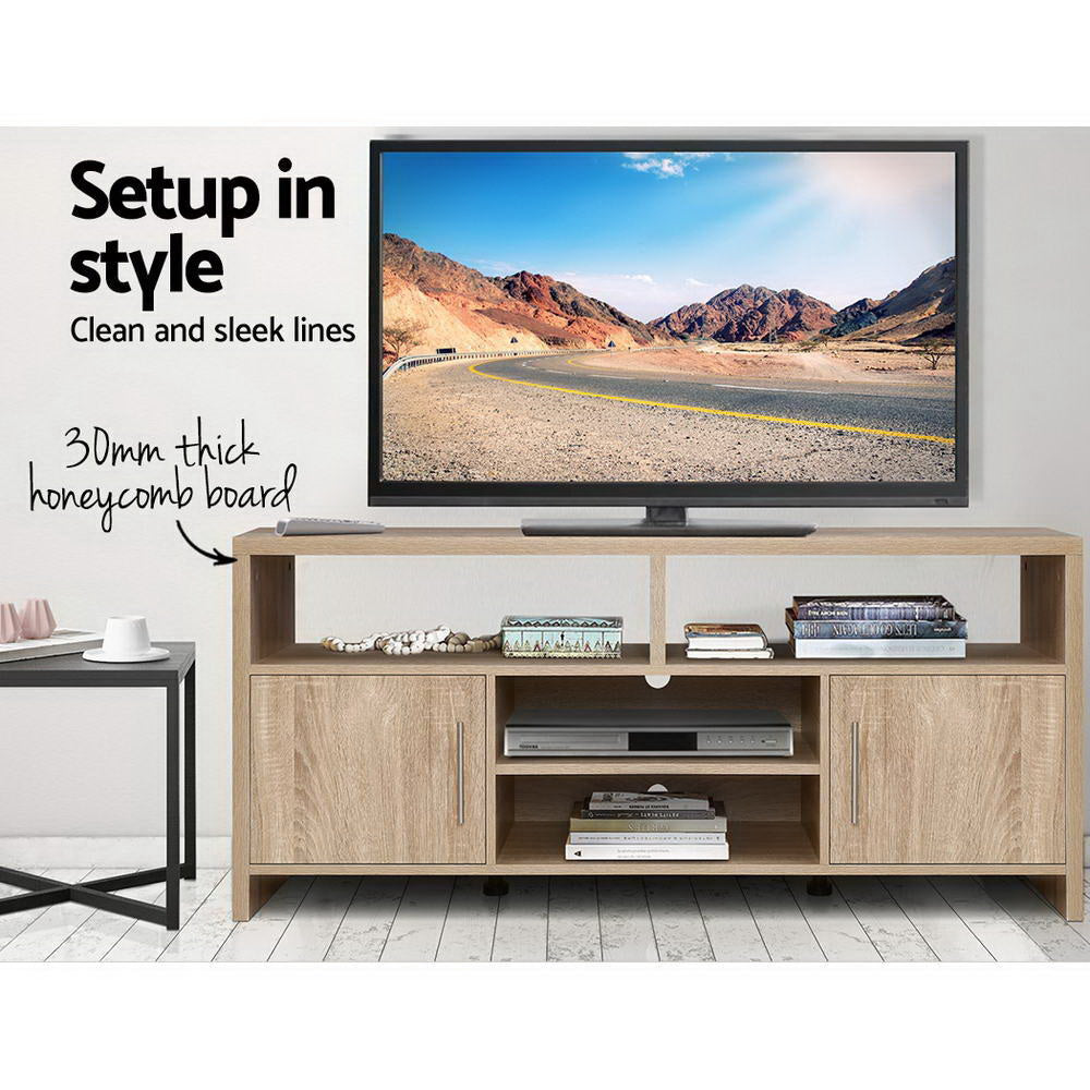 Oak TV stand 140cm setup in style lifestyle with wall-mounted TV and 30mm honeycomb board label