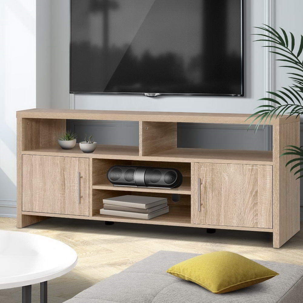 Oak TV stand 140cm in grey room with yellow cushion sofa round white coffee table and palm plant