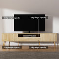 Oak TV unit in room showing capacity labels 60kg top surface 10kg open shelf 10kg per side cabinet