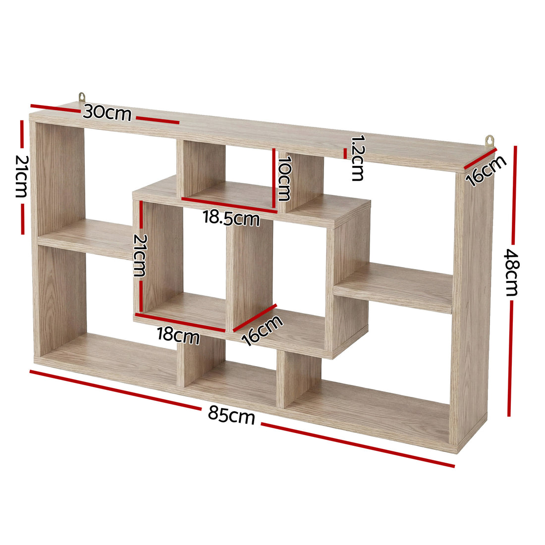 Natural oak wall-mounted display shelf with asymmetric grid compartments, styled with plants, ornaments and books