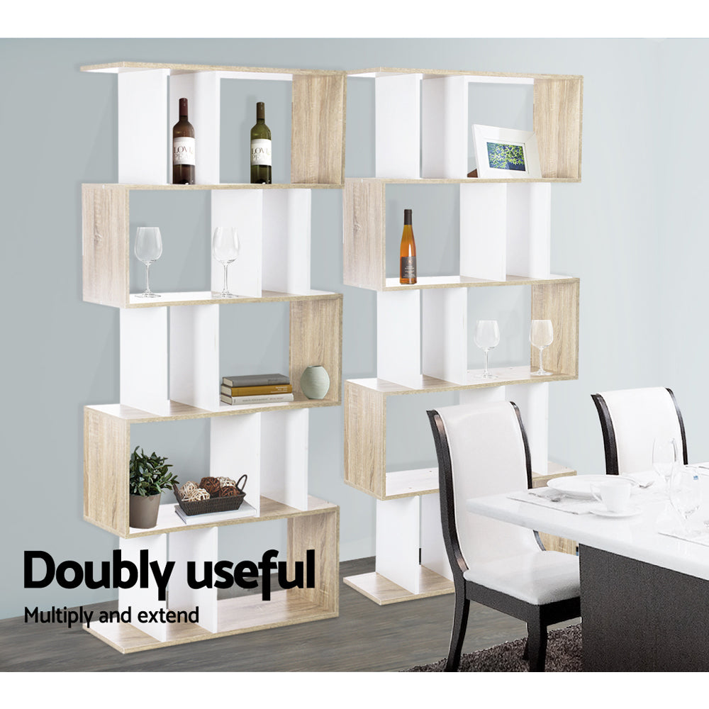 Two oak and white S-shaped 5-tier shelves as dining room divider with wine bottles and glasses; text reads Doubly useful