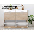 Two oak and white shoe cabinets in living room with flip-down doors open labelled ample storage