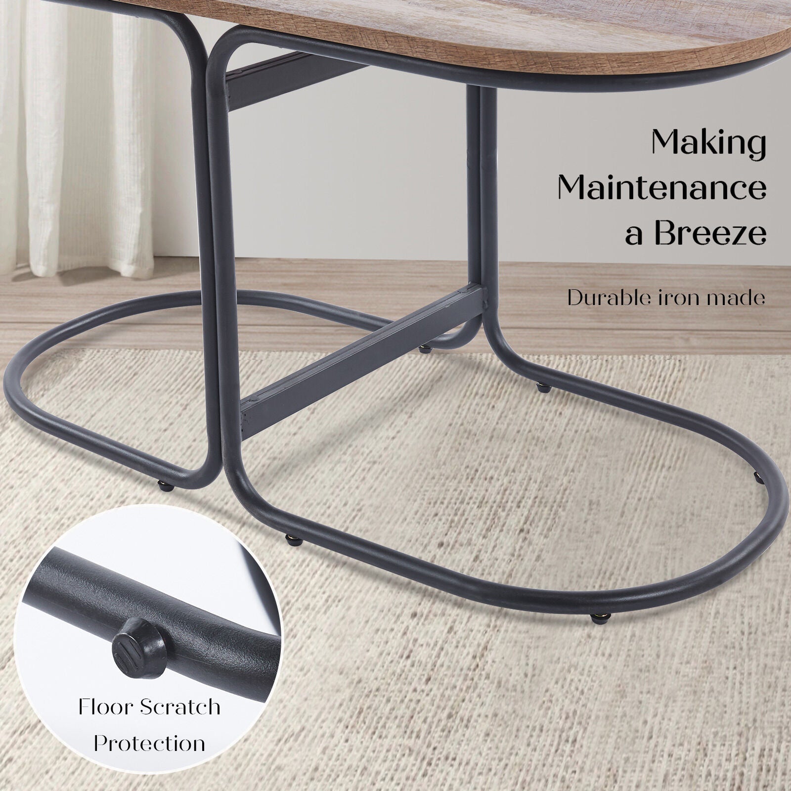 Close-up of the dark iron oval base frame of a coffee table on a light rug with a callout showing rubber floor scratch