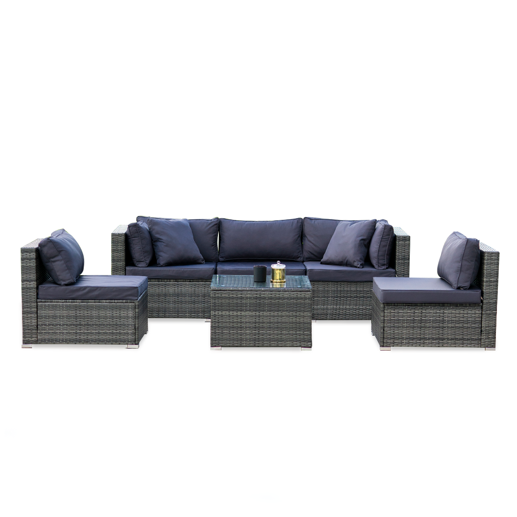 5-piece grey wicker outdoor sofa set with navy cushions in straight configuration with glass coffee table on white background