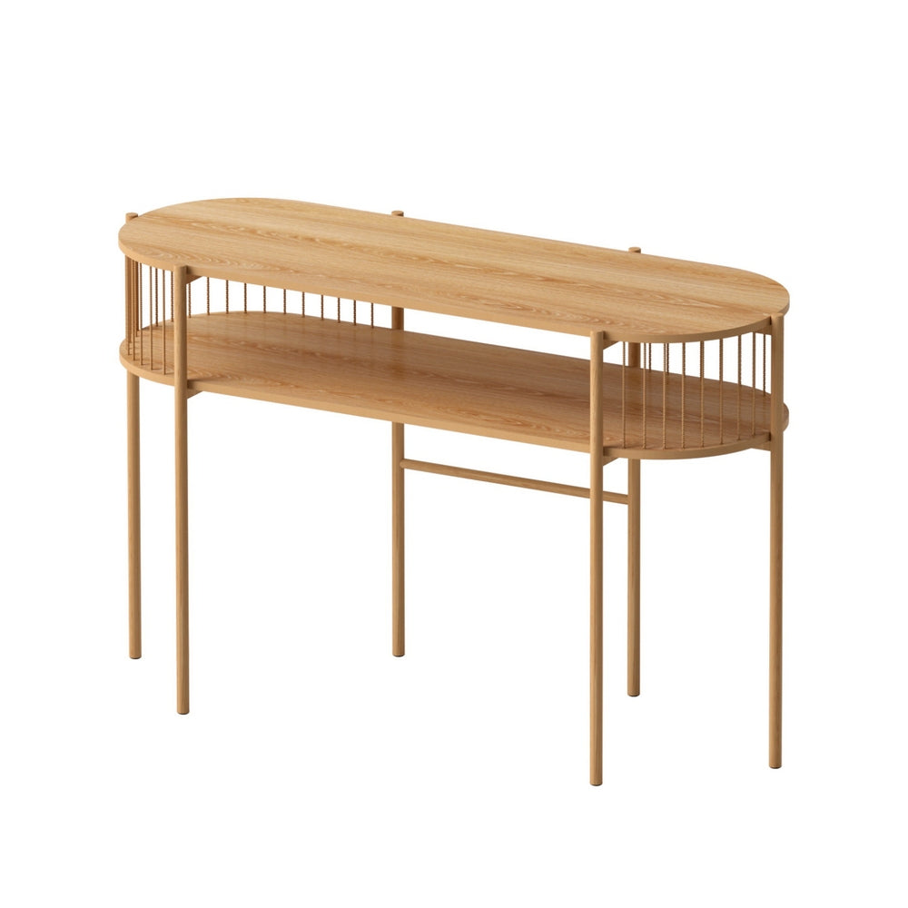 Oval console table with oak-effect top, spindle rail mid-section, lower shelf and four round legs, angle view