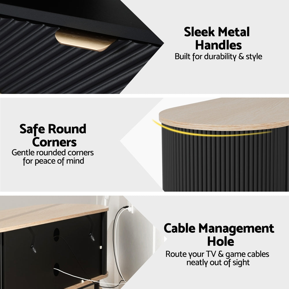 Oval oak-top black TV unit sleek metal handles safe rounded corners and cable management hole close-up details