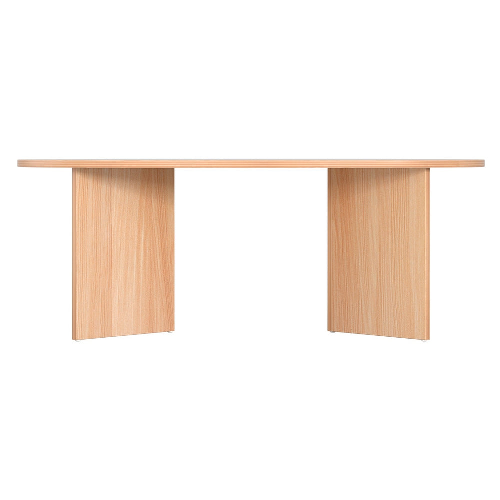 Oval natural wood coffee table front view on white background, showing both T-shaped panel legs