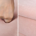 Split close-up: fist pressing into pink ottoman foam surface on left, fabric texture and stitching seam on right