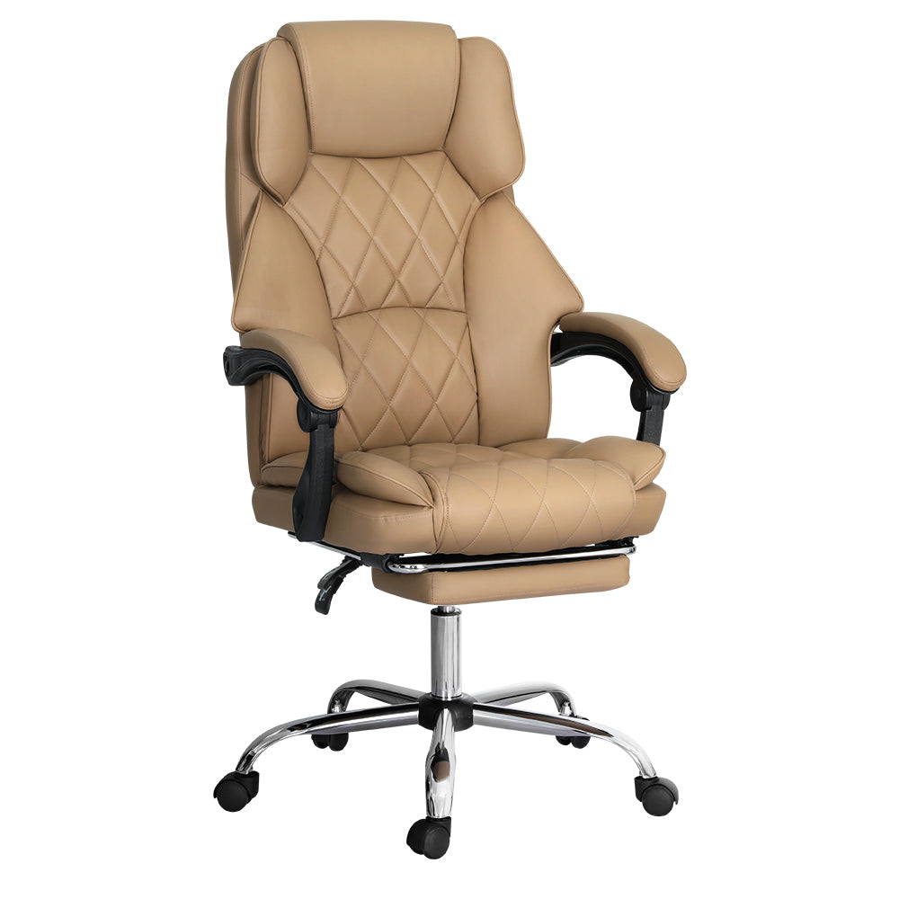 Tan PU leather high-back executive chair with diamond-stitch back, retractable footrest and chrome base on white background