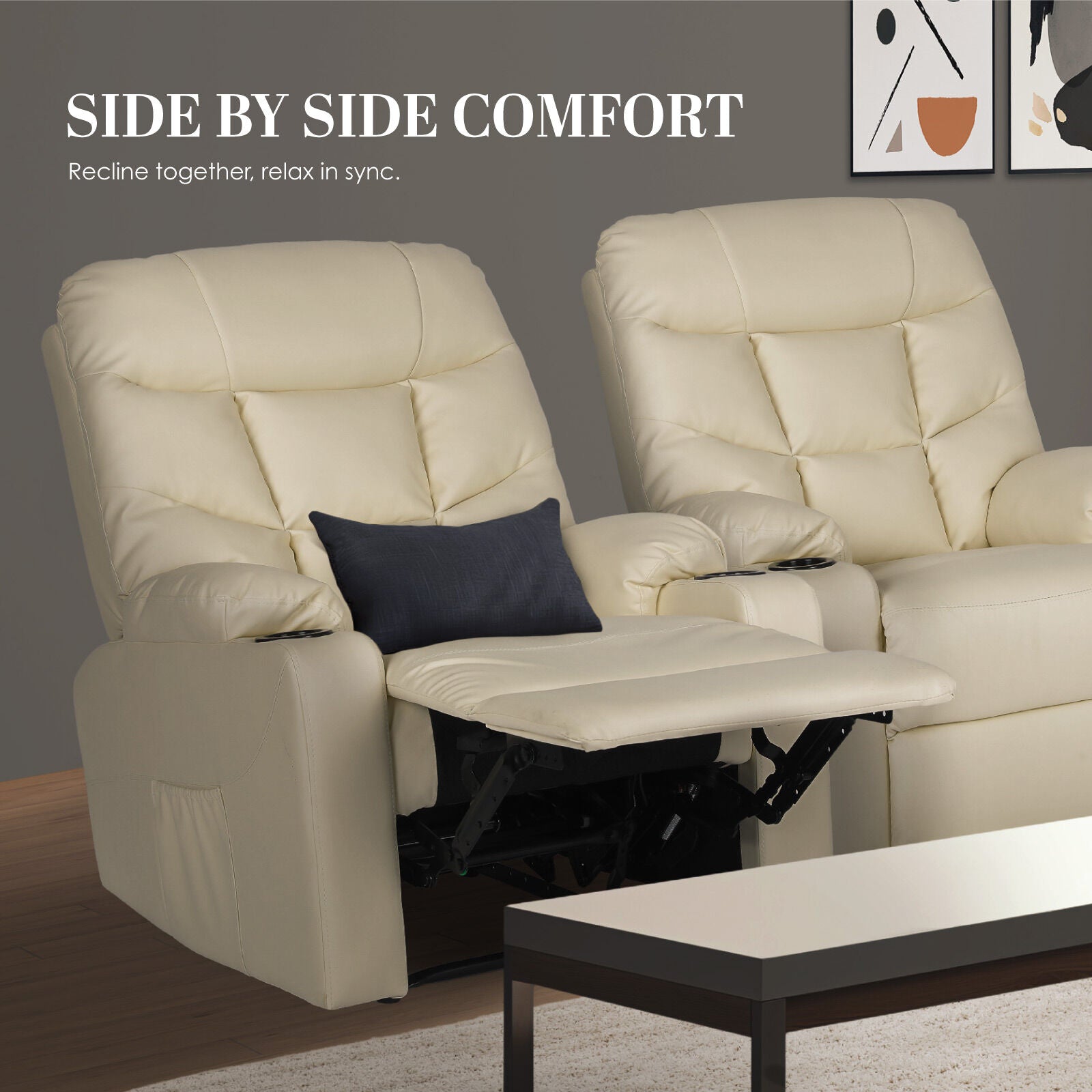Two cream tufted PU leather recliners side by side: one with footrest extended and navy cushion, one upright, in living room