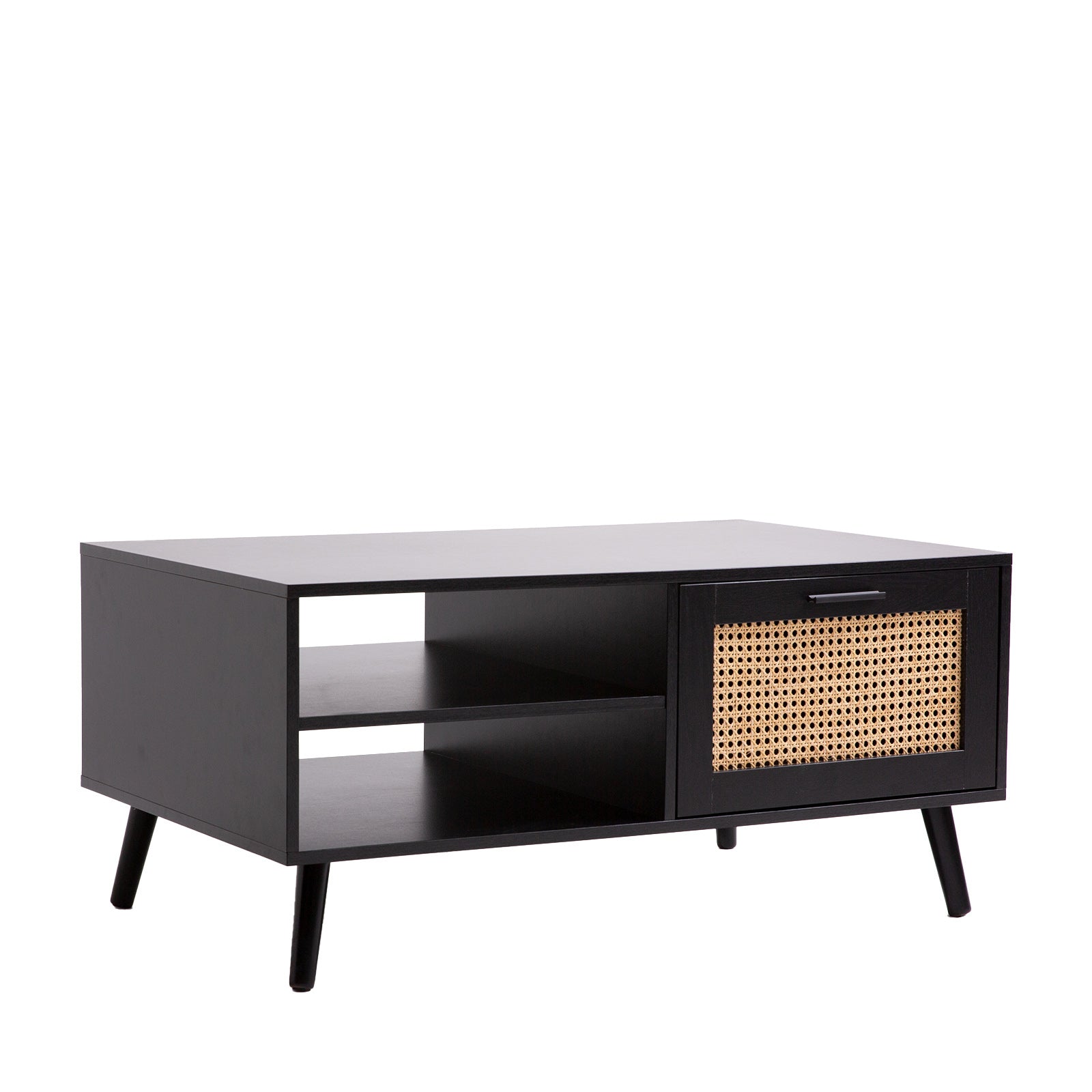 Black coffee table with rattan weave sliding door, two open shelves and black tapered legs, angle view, white background