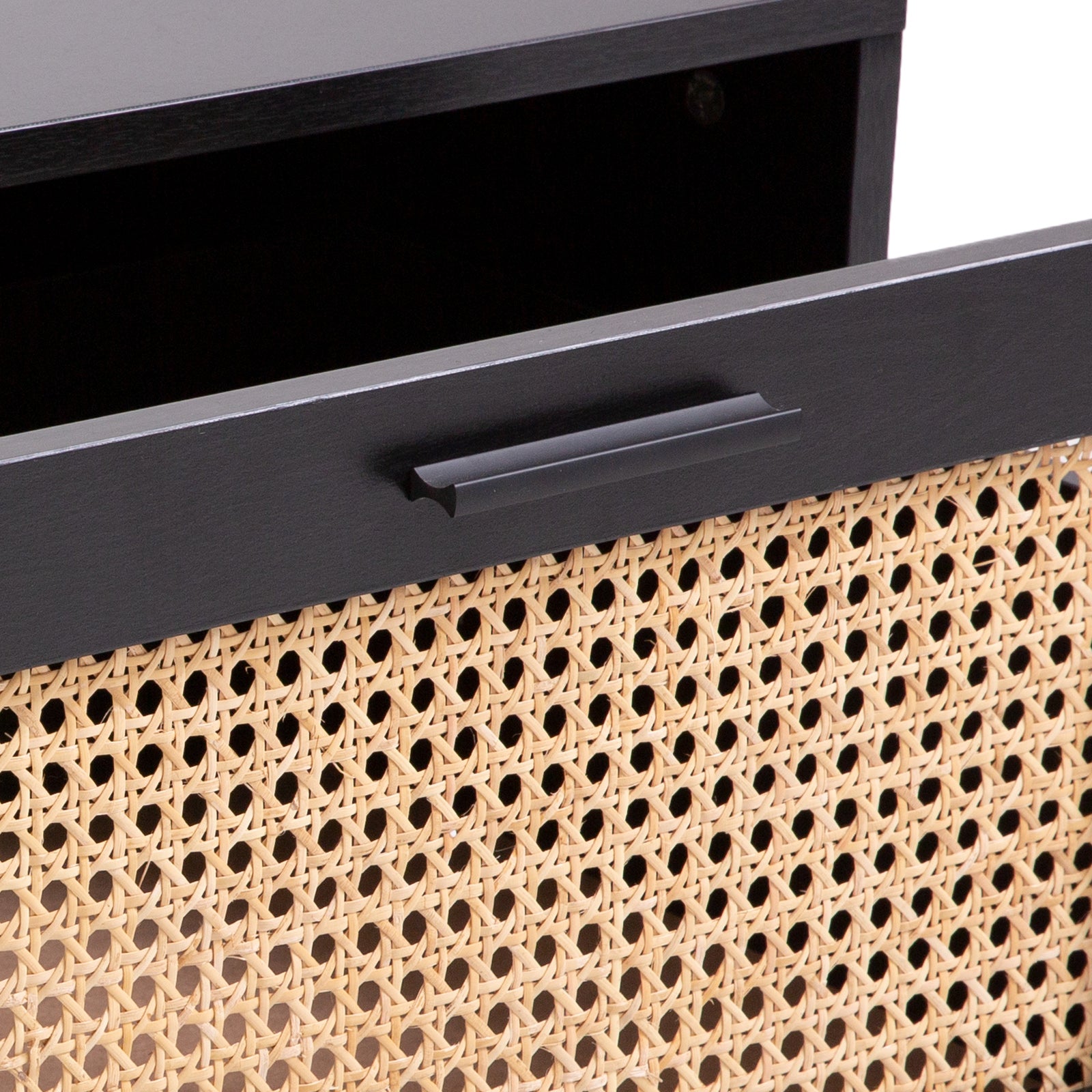 Close-up detail of black bar handle on rattan weave sliding door with storage compartment visible above