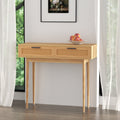 Oak console table with two rattan-weave drawers and black bar handles on tapered legs, styled with fruit bowl in room