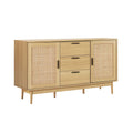 Natural wood sideboard with two rattan panel doors and three central drawers on angled white background view