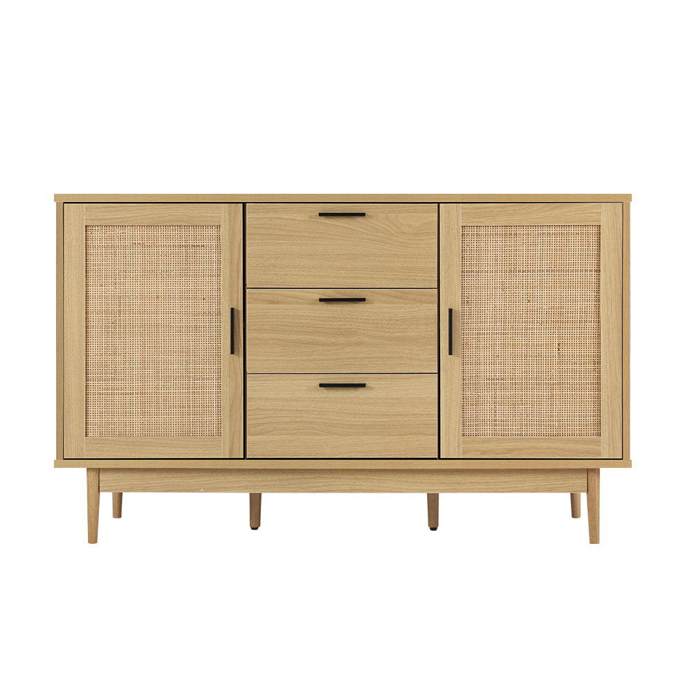 Natural wood and rattan sideboard with two cane doors and three central drawers, straight front view on white background