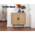 Rattan sideboard in living room with decorative items on top; text: stylish decor, real rattan
