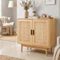 Natural oak sideboard with two woven rattan panel doors and tapered legs in living room, decorative items on top