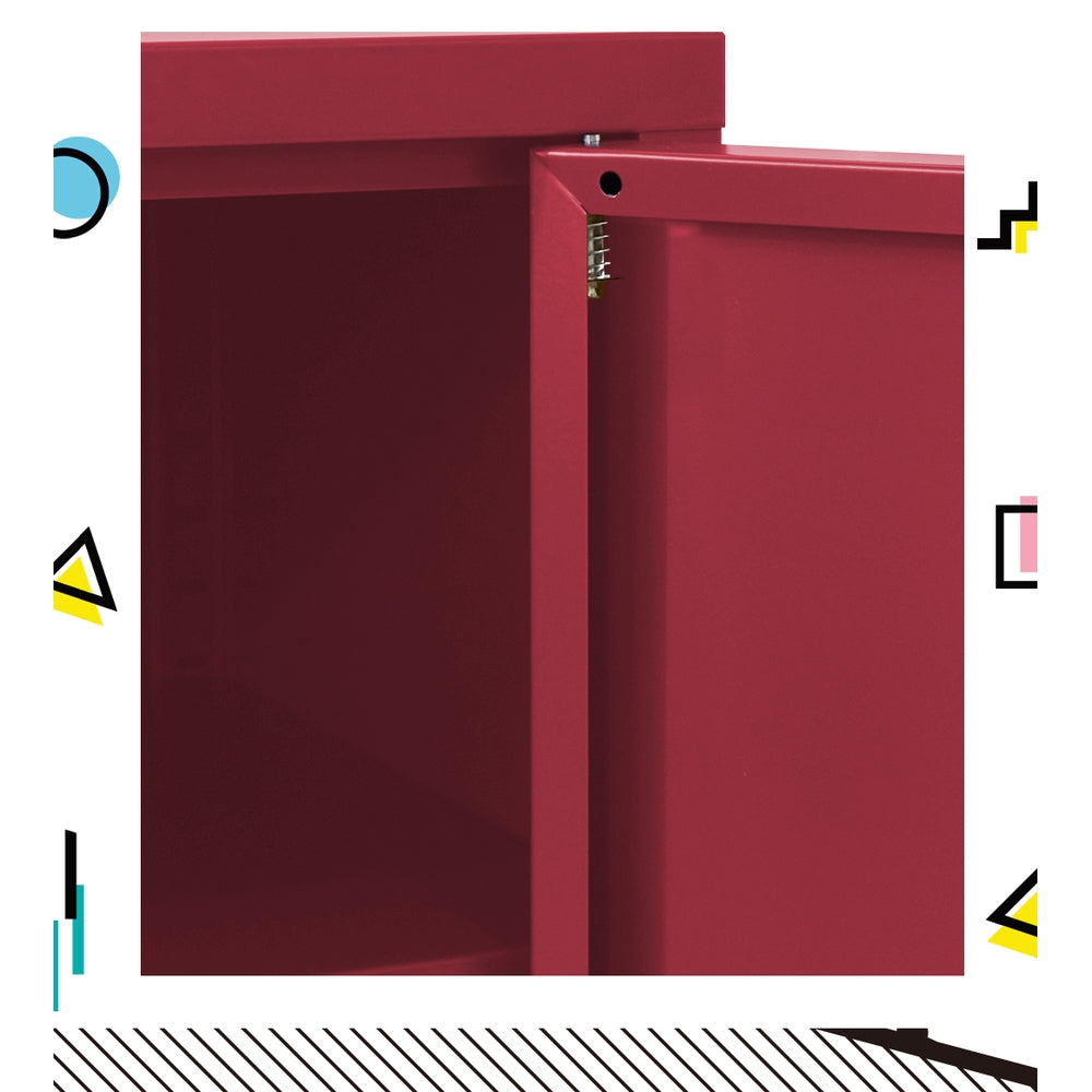 Close-up of red metal locker cabinet side corner showing spring door hinge mechanism between top panel and door