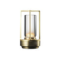 Gold retro lantern LED table lamp with rectangular metal frame and cylindrical glass tube on white background