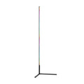 Slim RGB LED bar floor lamp on black T-shaped base with rainbow gradient colours, front view on white background