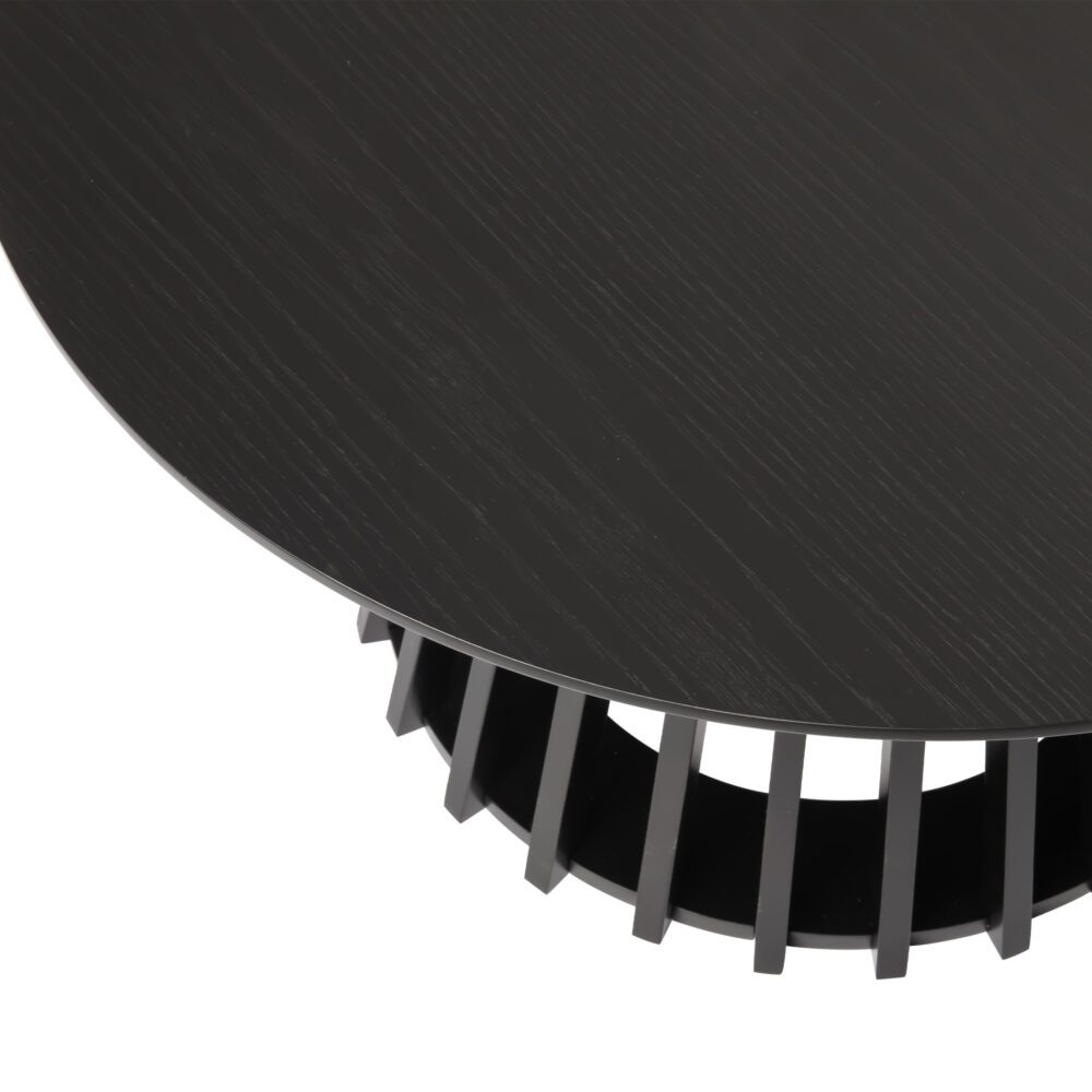 Close-up angle view of a black round coffee table top edge and slatted pedestal base showing joint detail