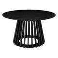 Black round coffee table with slatted wood pedestal base on a white background, front view showing full profile