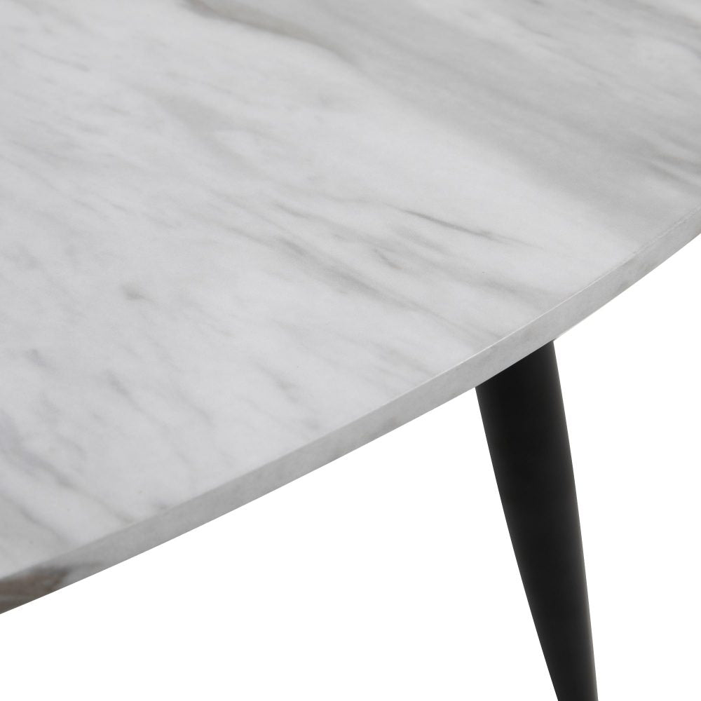 Close-up detail of white marble-effect tabletop surface with grey veining and black tapered leg on white background