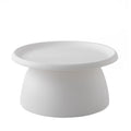 Round white coffee table with wide overhanging tray top and tapered cylindrical pedestal base on white background