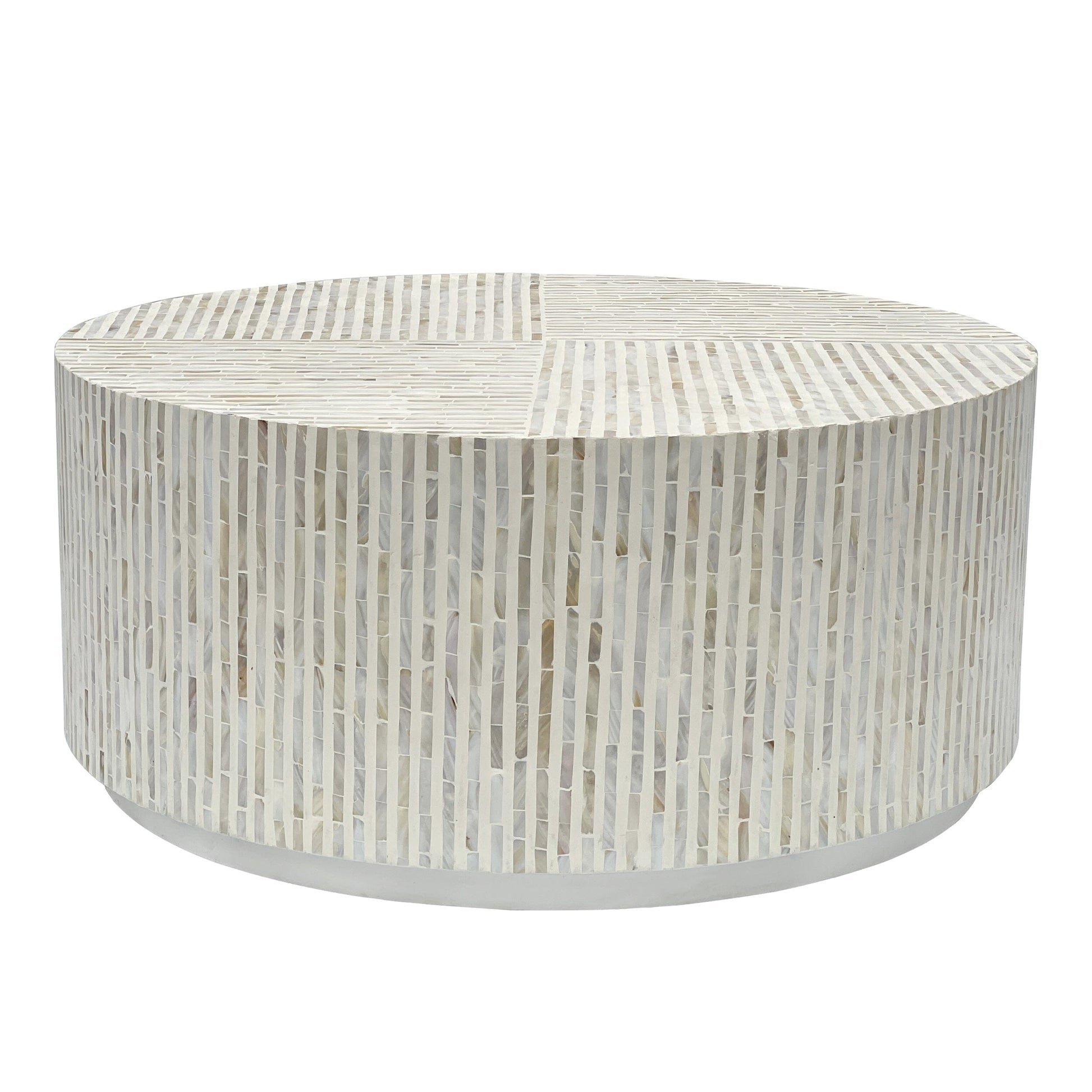 Round drum coffee table covered in vertical mother of pearl mosaic tiles in white and cream tones, straight on view against