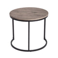 Large round coffee table with grey-tone wood top and black metal ring base with three vertical support bars, white background