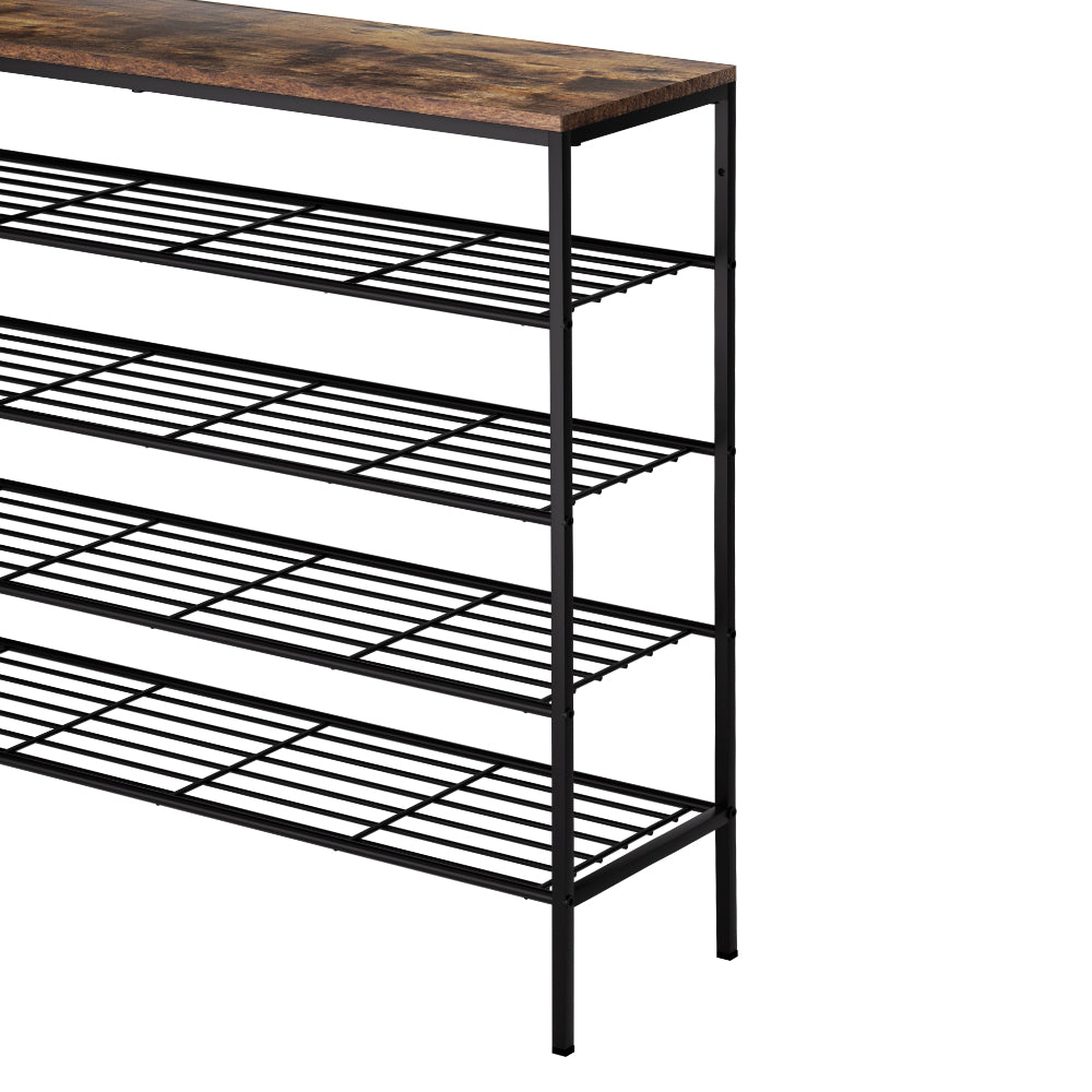 Close-up of wire grid shelf and black steel frame corner on rustic industrial 4-tier shoe rack