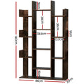 Rustic tree bookcase dimensions: 86cm wide, 25cm deep, 140cm tall with staggered asymmetric shelves on three posts
