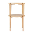 Round two-tier natural oak side table with rope-twist metal spindles on white background, front view showing four legs and