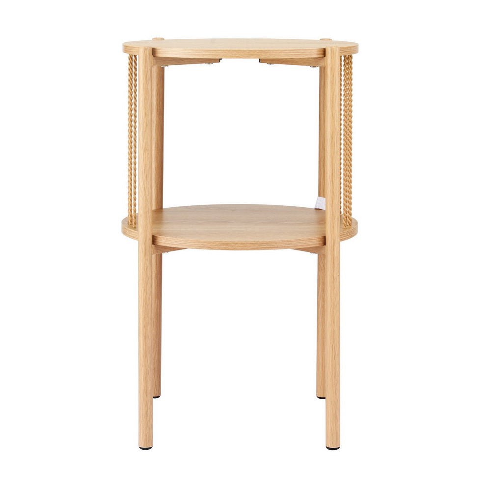 Round two-tier natural oak side table with rope-twist metal spindles on white background, front view showing four legs and