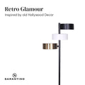Sarantino three-arm lamp with black, white, and brass drum shades and text 