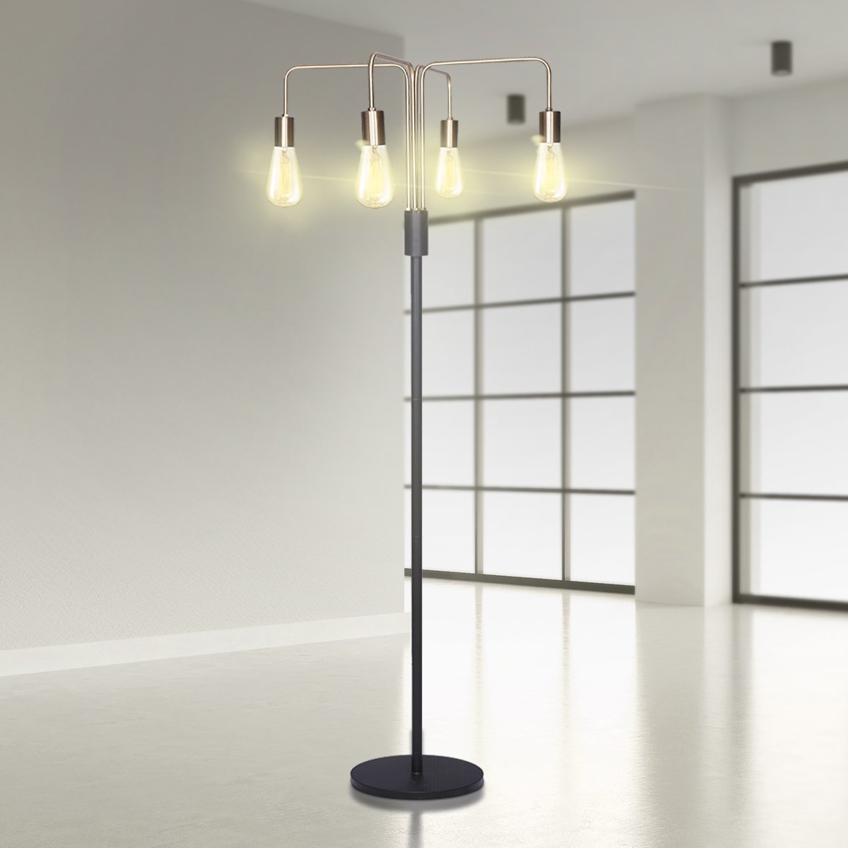 Four-arm industrial floor lamp with lit Edison bulbs in a minimal modern room with frosted glass panels