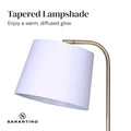 Sarantino close-up of white tapered lampshade on brass arc arm with text 