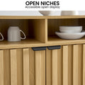 Close-up of Sarantino Eleni sideboard open niches with mug and plates, fluted doors below, text: Open Niches