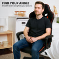 Man seated in black and red gaming office chair with find your angle recline infographic, bedroom setting