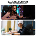 Sarantino black kids gaming chair Game Learn Repeat lifestyle: teen girl gaming with headset and teen boy studying at laptop