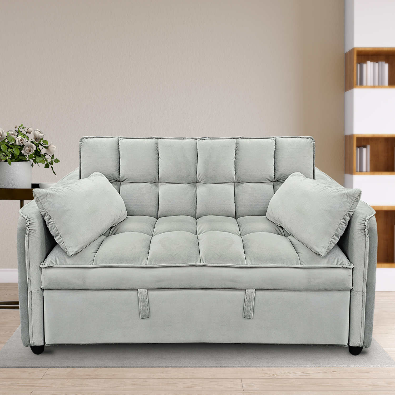 Sarantino Quincy light grey velvet sofa bed in lifestyle room with bookshelf and indoor plant